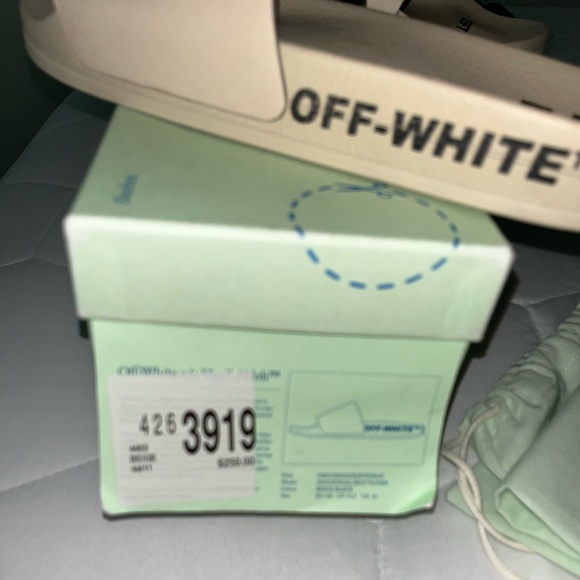 men off white slides size 10 1/2 with box and dust bag In good condition,